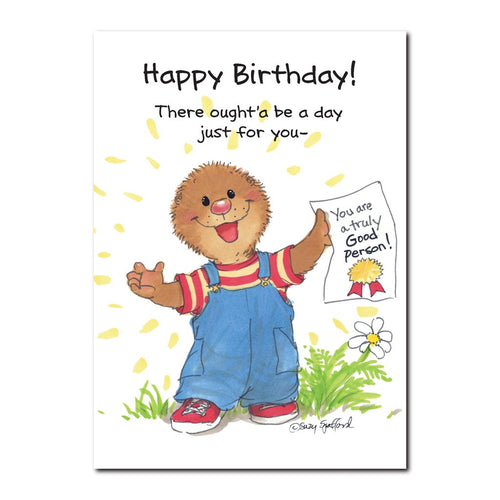 Ollie Marmot has a kind-hearted greeting card in his hand in this Suzy's Zoo happy birthday greeting card.