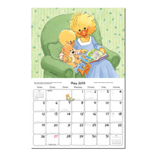 A mom and baby duck read a story in this 2019 suzys zoo calendar page.